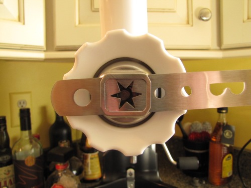 Star attachment on KitchenAid meat grinder. 